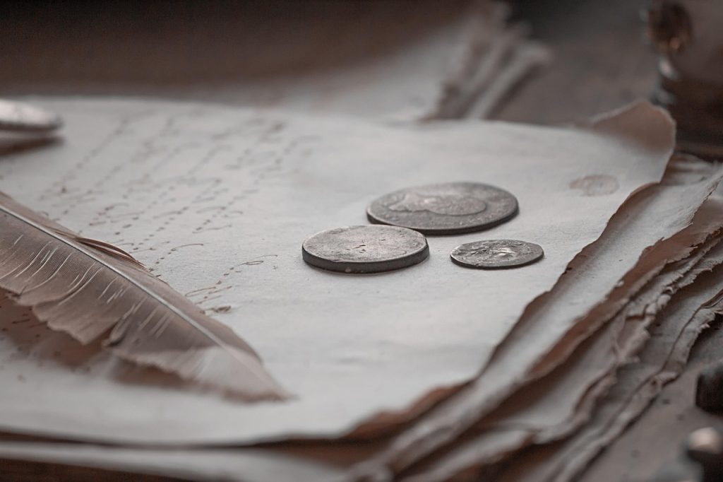 Book, coin, money — Buying Process of the A / R Financial Institution