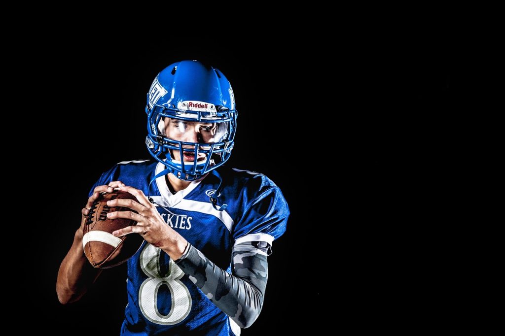 American football, athlete, ball — "Follow College Football Streams on Reddit"