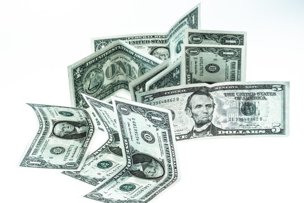 Banknotes, us-dollar, dollar — How Can Financial Advisors Assist You In Estate Planning?