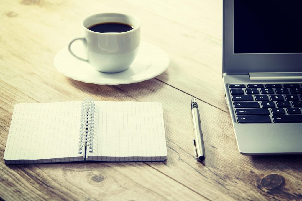 Coffee, computer, cup — Security First: How NovaX Ensures Safe Crypto Transactions