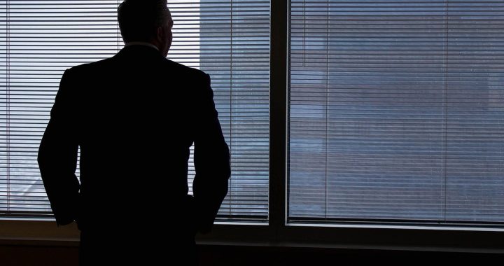 Businessman, silhouette, windows — Fast ways to get breast implants Miami